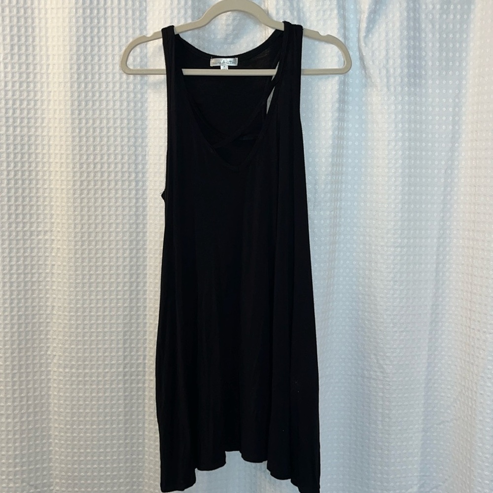 Barely worn, good condition, cute over a swimsuit